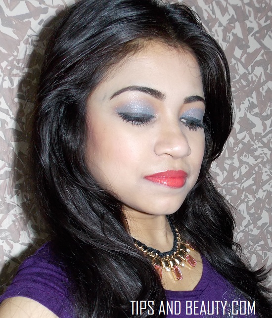 Smokey Blue eyes and Coral Lips party makeup Look