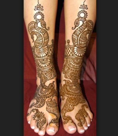 Elaborate Full Feet Mehndi with Peacock image