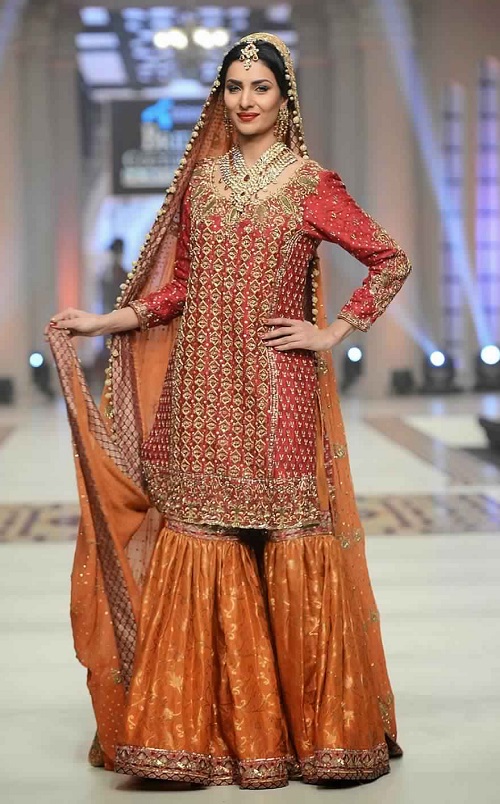 red kurta and orange sharara