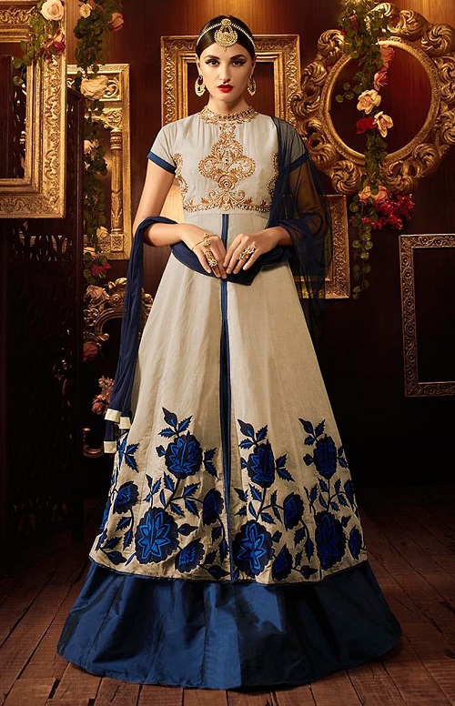beige kurta with blue lehenga