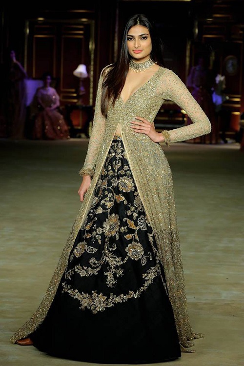 gold kurta with black lehenga