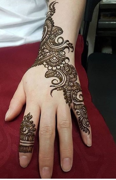 Side Swept Bail Mehndi Design for Girls