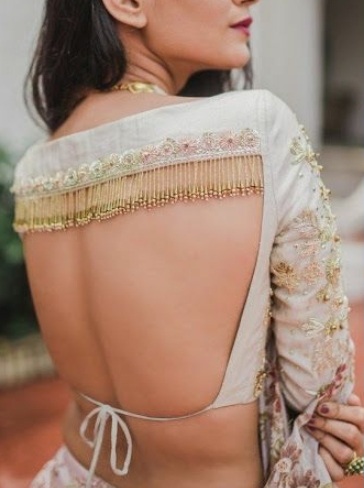 Voguish Belted Saree Blouse Ideas | Netted blouse designs, Long blouse  designs, Designer blouse patterns