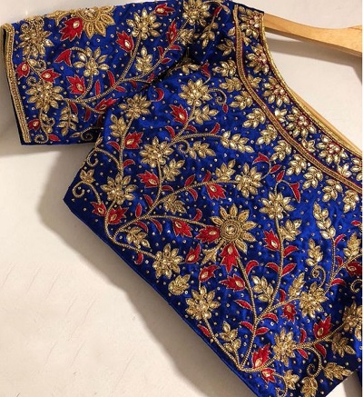 Blue saree blouse with thread work and sequins
