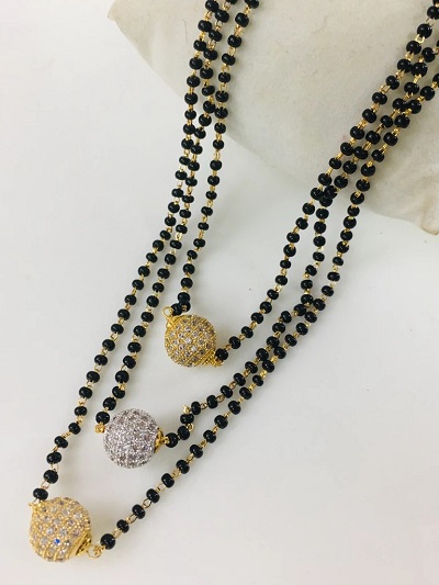 Gold and stoned studded mangalsutra pattern