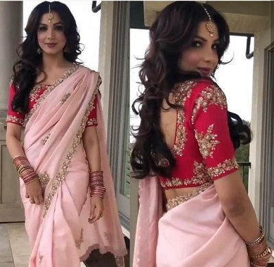 Red Heavy Blouse With Simple Pink Saree