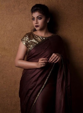 Stylish Wine Coloured Plain Saree With Gold Heavy Blouse