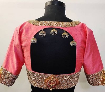 Backless maggam blouse with jewelleryBackless maggam blouse with jewellery