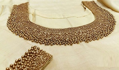 Bead work blouse with medium sleeves