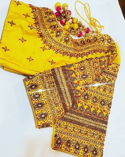 Heavy yellow designer blouse for silk saree