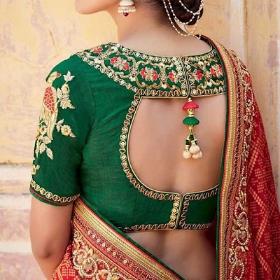 Stylish cut at the back saree blouse design