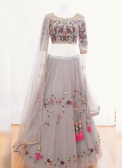 Heavily Embroidered blouse with Net simple Lehenga
