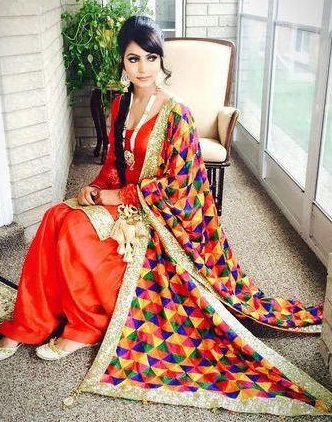 Orange Punjabi Suit With Border And Phulkari Dupatta