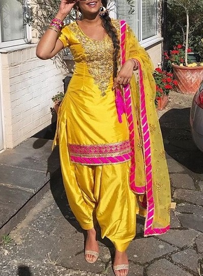 Yellow Short Punjabi Suit With Pink Border