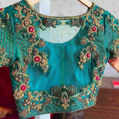 Embroidered And Cut Work Silk Blouse Design