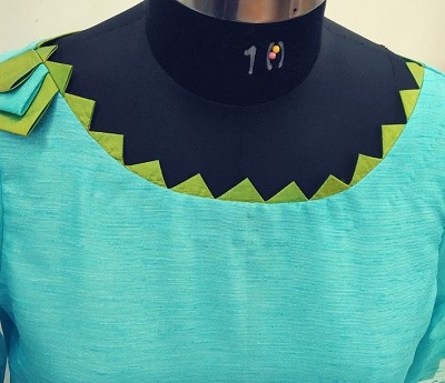 Round neckline with triangle patterns