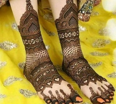 Floral and heart shape mehndi design