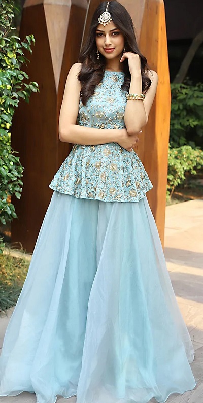 Stylish boat neckline sleeveless peplum blouse for lehenga