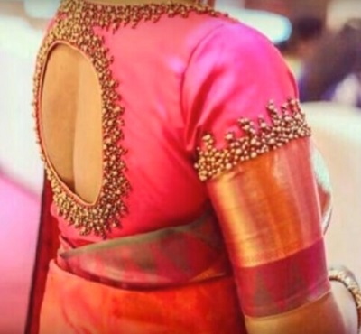 Bead work silk saree back neck blouse design with border