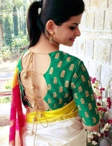 Half backless silk saree design with strings