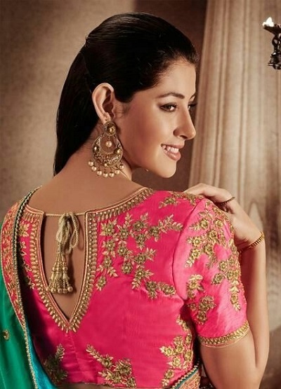 Heavy embellished V cut at the back silk saree blouse design