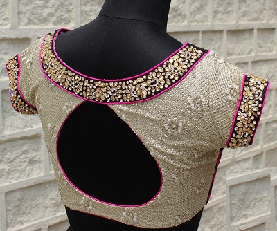 Stylish blouse with Kundan work and Zari stones