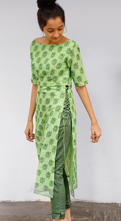 Stylish side string kurti with solid green trousers