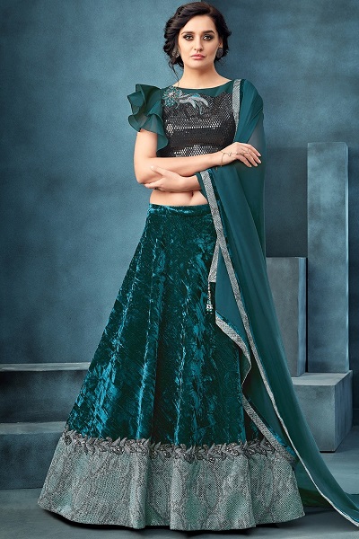 Designer turquoise velvet lehenga with broad border