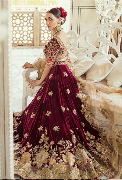 Floral embroidered maroon velvet lehenga for bridal wear