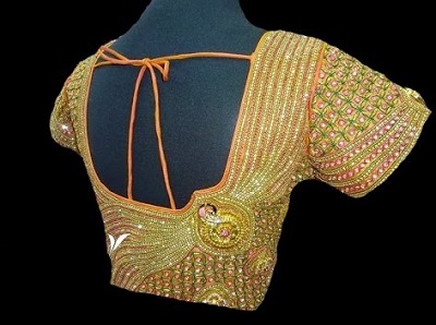 Heavy Stone And Maggam Work Blouse For Weddings
