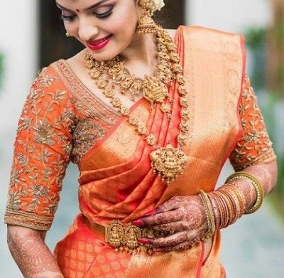 Orange embroidered Silk party wear blouse design