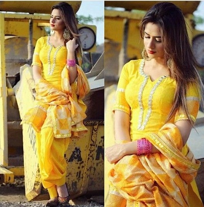 Partywear short yellow embroidered Punjabi suit for parties