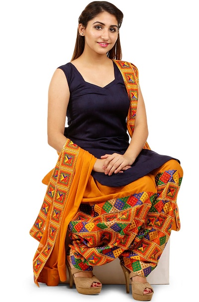 Sleeveless black Phulkari suit with orange dupatta