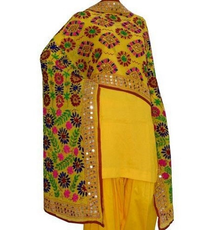 Beautiful simple yellow suit with yellow Phulkari mirror work dupatta
