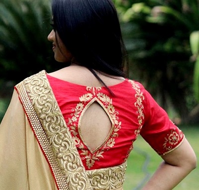Blouse With Elegant Cut At The Back Design