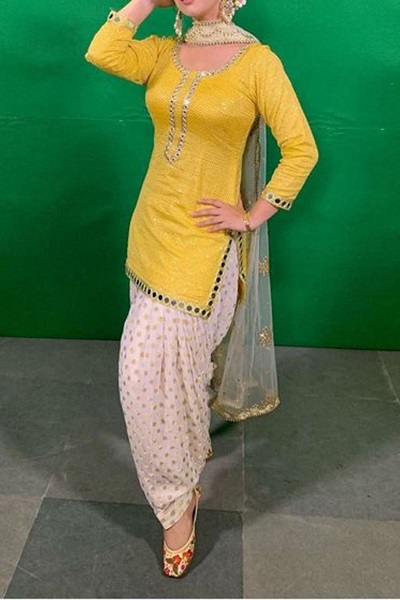 Short Yellow Kurti With Punjabi Patiala Salwar And Net Dupatta