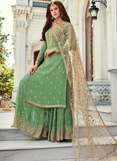Green straight kurta with heavily embellished palazzo and net Golden dupatta