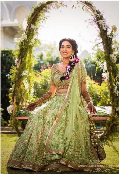 Heavy embellished net embroidered lehenga for bridal mehendi