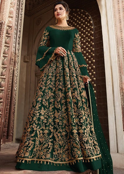Long green heavily embellished gown for parties