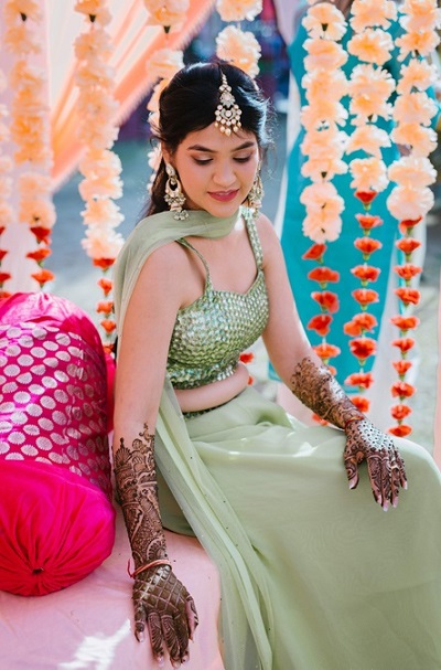 Mint green coloured lehenga for bridal mehendi ceremony