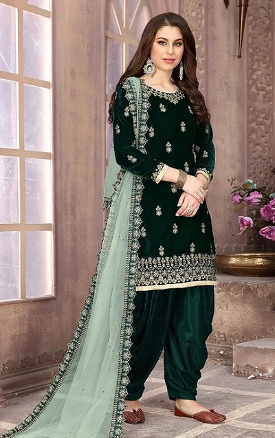 Velvet dark green salwar kameez with net dupatta