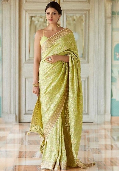 Stylish Green Saree For Bridal Mehndi Designs