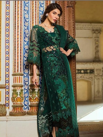 Designer wedding wear bottle green net salwar suit dress