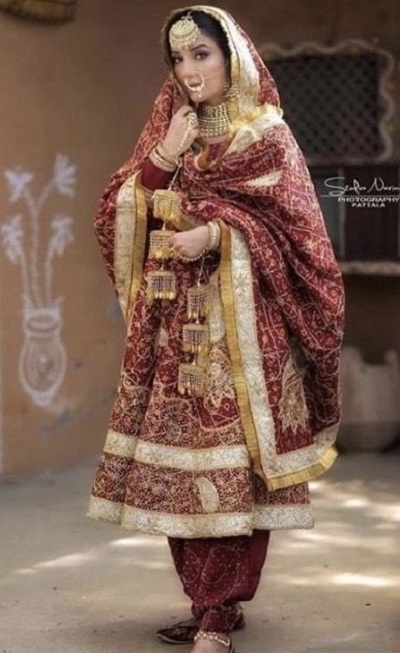 Maroon heavy embroidered Anarkali salwar suit for brides