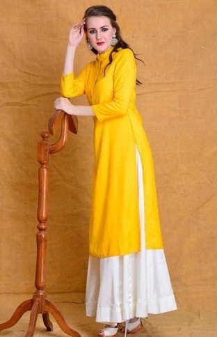 Yellow rayon 3/4 sleeves kurta with white full flared skirt