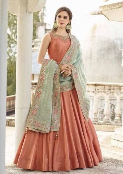 Elegant peach long Anarkali suit with net heavy dupatta