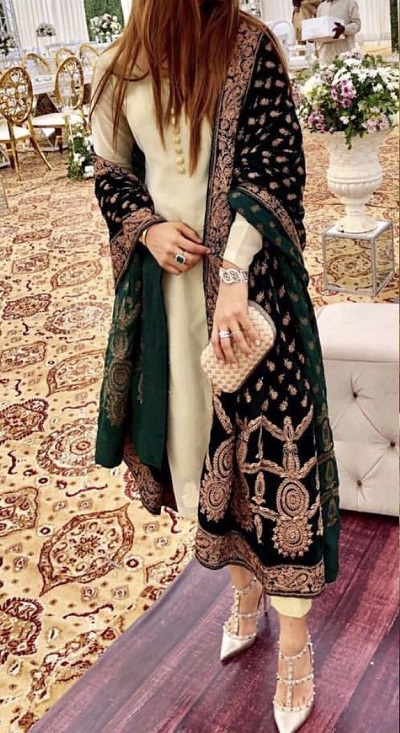 Stylish solid suit with heavy green dupatta