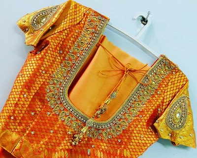 Orange silk saree blouse pattern with embellishment