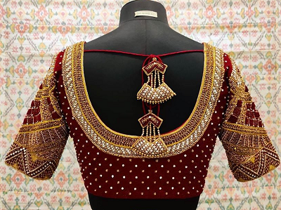 Velvet heavily embellished aari work bridal blouse design