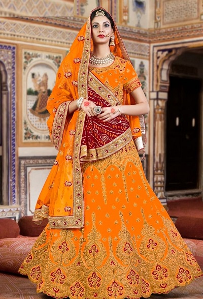 Silk Cutwork Heavily Embellished Orange Lehenga With Bandhej Dupatta